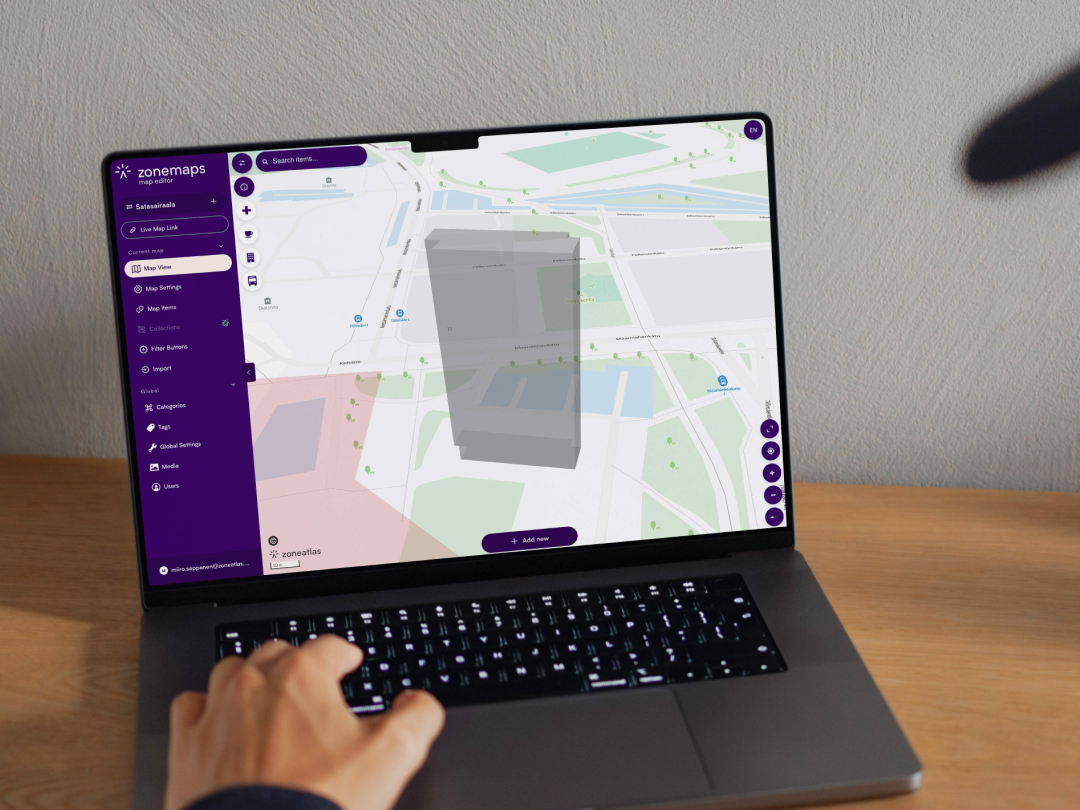 Zoneatlas Manager 3D building map editor on laptop showing indoor facility layout with interactive floor plan and navigation interface