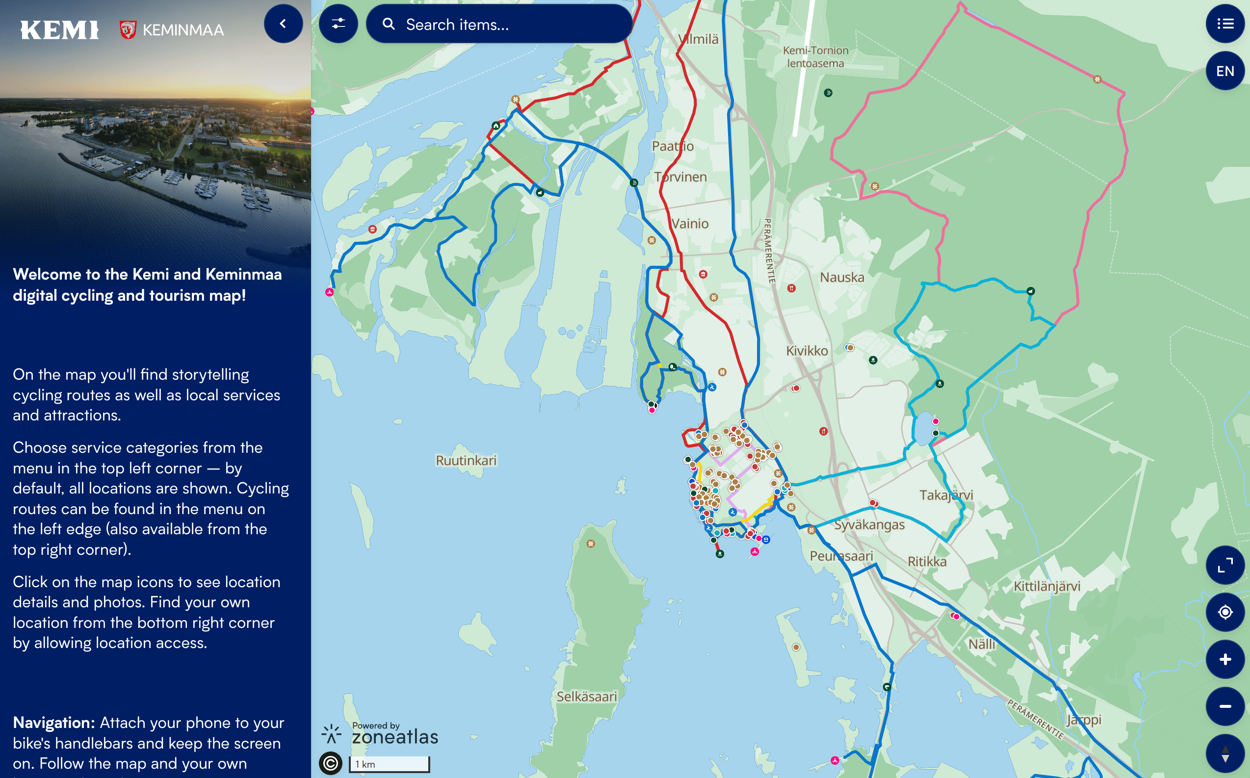 kemi-keminmaa-screenshot 9 Interactive map of Kemi and Keminmaa showing cycling routes with blue and green lines, local services marked with colored dots, and location details displayed on the left side panel.