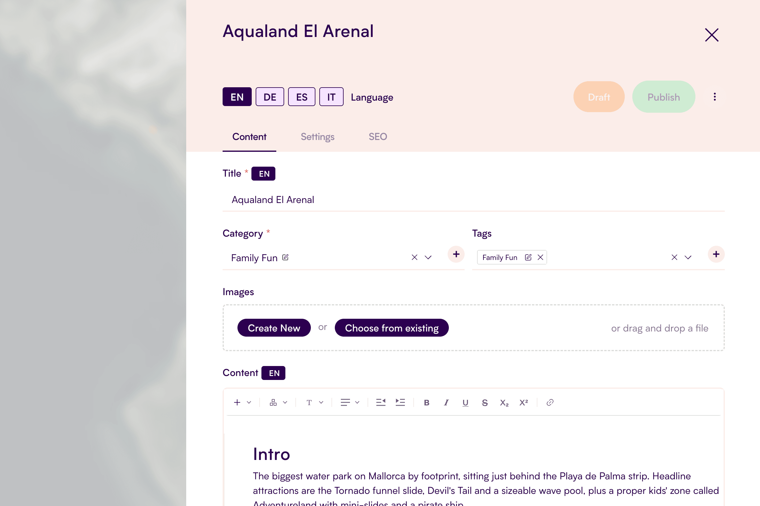 Zoneatlas content editor with multi-language support showing English, German, Spanish and Italian language options for Aqualand El Arenal water park entry